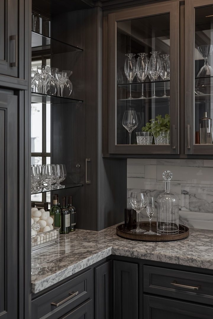 17. Add Glass Cabinets Above a Bar Area
