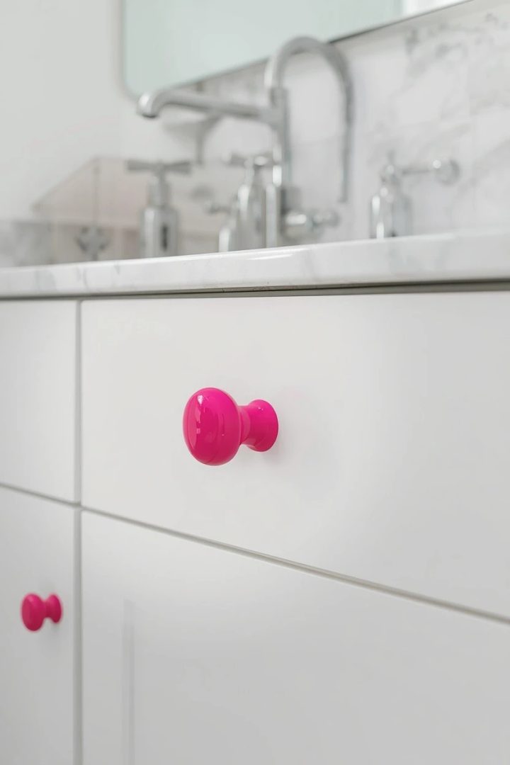 17. Hot Pink Cabinet Hardware and Fixtures