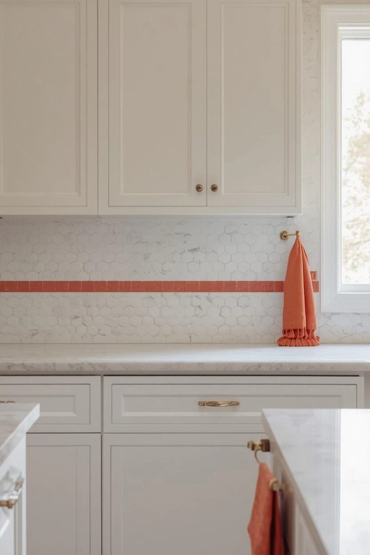 2. White Hexagonal Tiles With a Coral Border Stripe