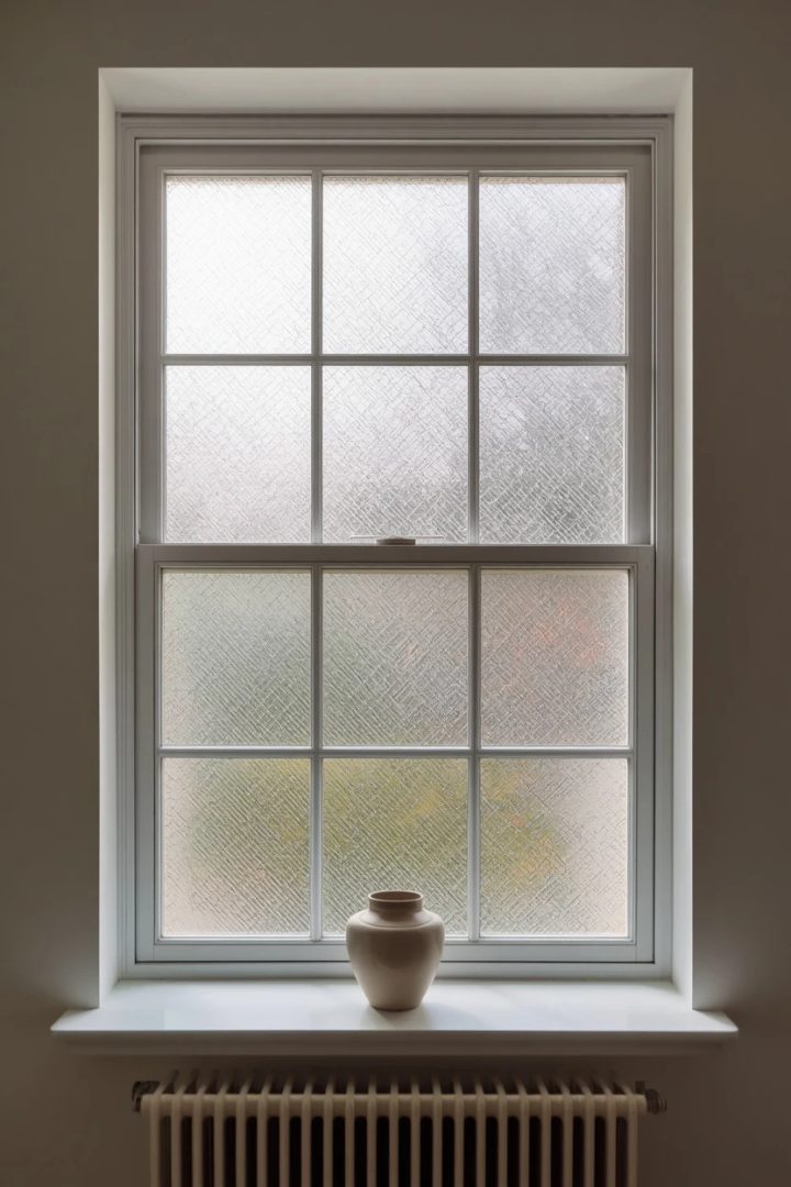 12. Frosted Glass Film for Privacy Without Curtains